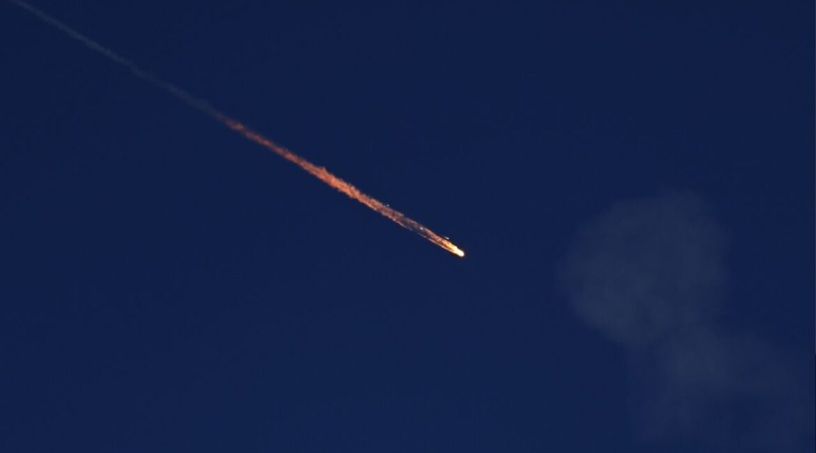 A fragment falls through the sky after Israel's Iron Dome intercepted a missile launched from Iran towards Israel, amid the Iran-Israel conflict, as seen from Ashkelon, Israel June 20, 2025. REUTERS/Amir Cohen