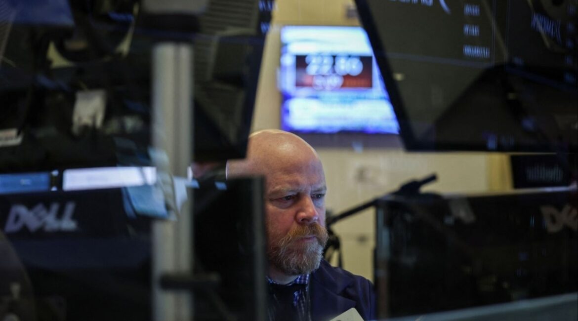 A trader works on the floor at the New York Stock Exchange (NYSE) in New York City, U.S., May 30, 2025. REUTERS/Jeenah Moon/File Photo
