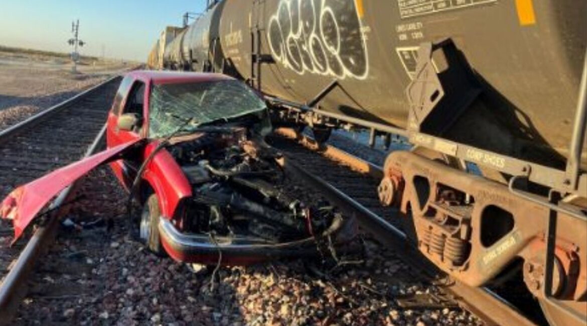 A train struck a truck that had become stuck on the railroad tracks near Highway 43 and Palmer in Tulare County, causing no injuries and only minor damage to the train. (Tulare County FD)