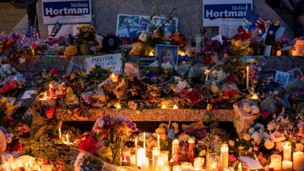 Candles and flowers adorn a memorial outside the Minnesota State Capitol following the killing of Democratic state assemblywoman Melissa Hortman and her husband Mark, in St. Paul, Minnesota, U.S., June 18, 2025. (Reuters/Tim Evans)