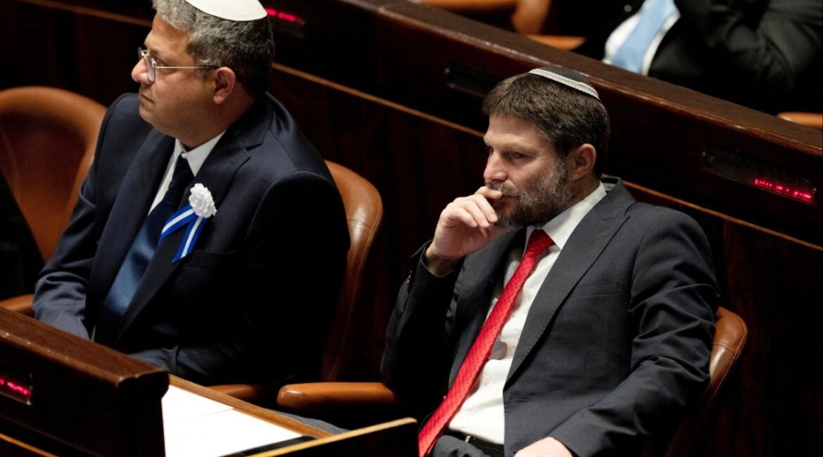 Far-right Israeli lawmakers Itamar Ben Gvir, center, and Bezalel Smotrich, right, attend the swearing-in ceremony for the new Israeli parliament, at the Knesset, or parliament, in Jerusalem, November 15, 2022. Maya Alleruzzo/Pool via REUTERS/ File Photo