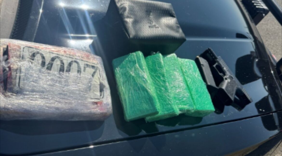 Fresno County CHP arrested two on Interstate 5 after finding about one kilogram of suspected cocaine, a loaded ghost gun, and counterfeit money during a vehicle search on Sunday, June 29, 2025. (CHP)