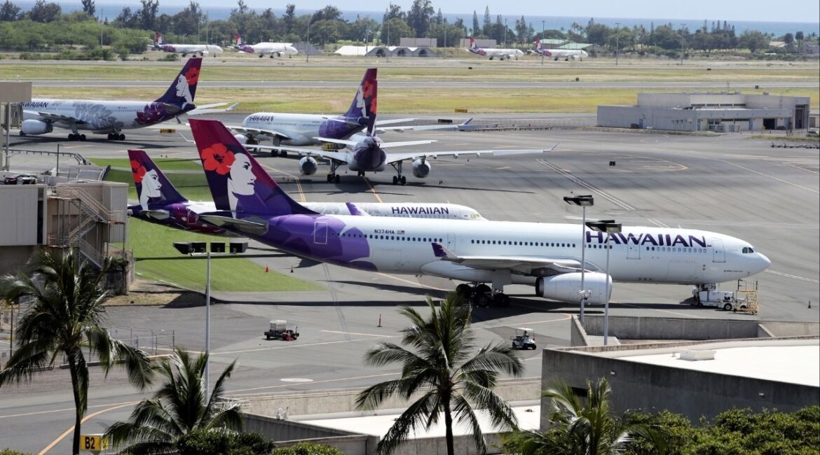 Hawaiian Airlines airplanes on the runway at the Daniel K. Inouye International Airport in Honolulu, Hawaii, U.S. April 28, 2020.