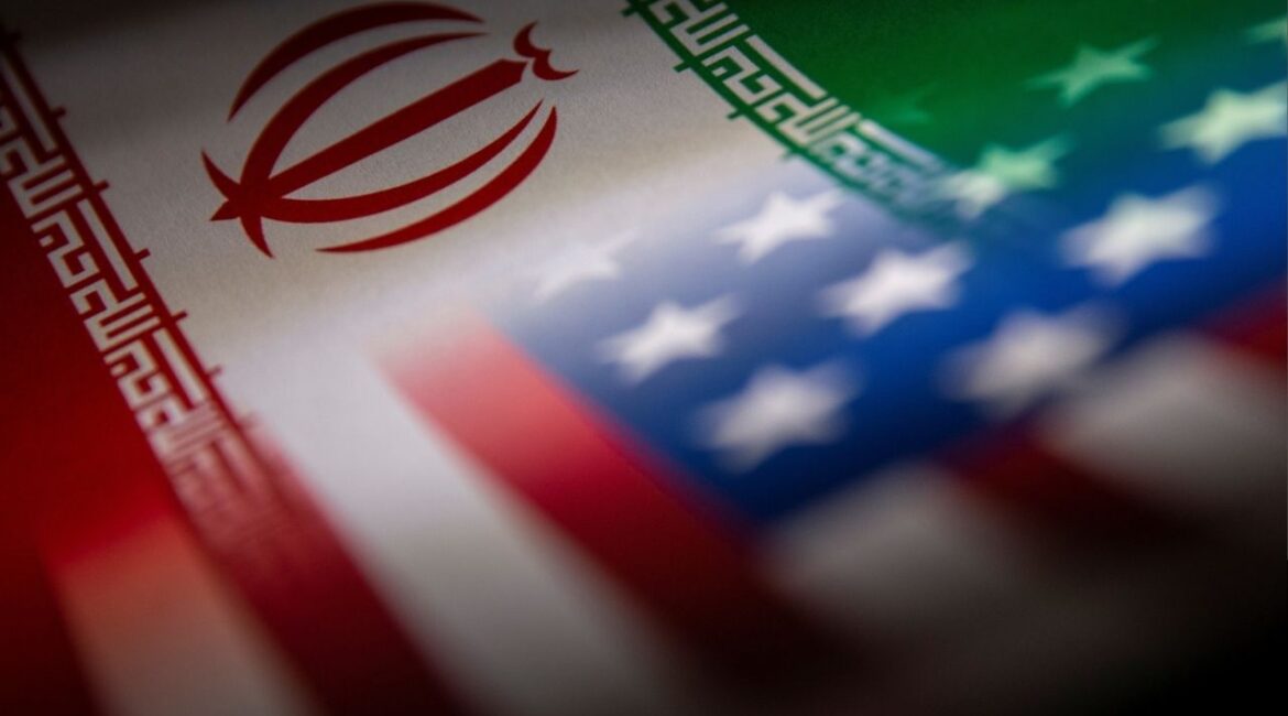 Iran's and U.S.' flags are seen printed on paper in this illustration taken January 27, 2022. (Reuters/Dado Ruvic/Illustration)