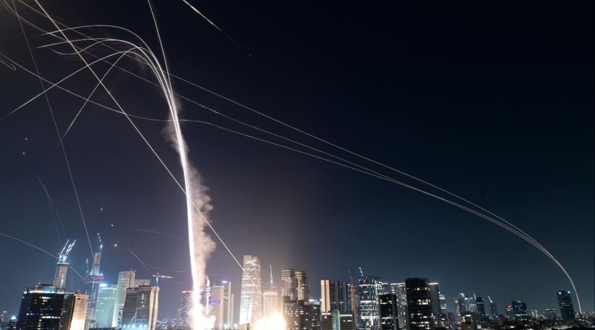 Israeli Iron Dome air defense system fires to intercept missiles over Tel Aviv, Israel, Friday, June 13, 2025. (AP Photo/Tomer Neuberg)