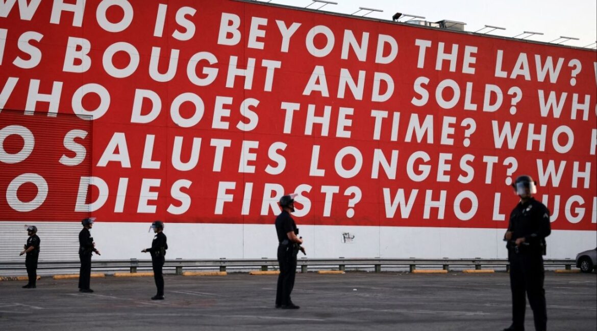 Law enforcement officers stand guard outside MOCA (Museum of Contemporary Art), during a protest against federal immigration sweeps, in Los Angeles, California, U.S., June 12, 2025. (Reuters/David Swanson)