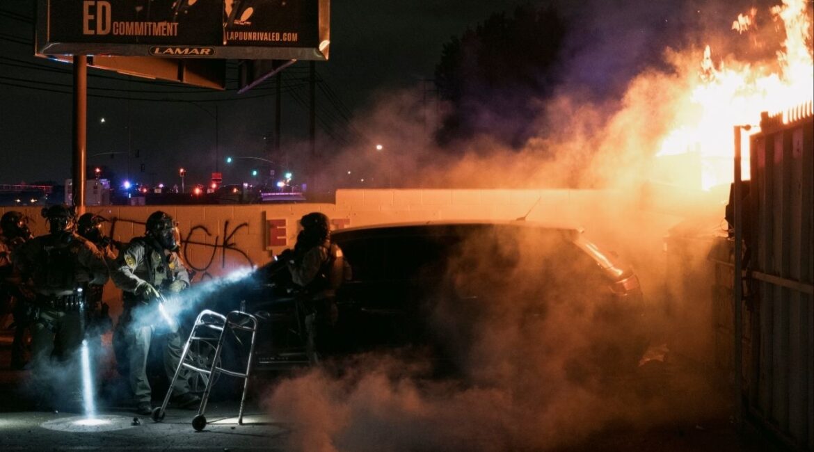 Los Angeles County sheriff’s deputies clash with protesters in Compton, Calif., south of Los Angeles, Saturday, June 7, 2025. Los Angeles was quiet on Sunday morning as the first members of the National Guard arrived after President Trump took the extraordinary action of ordering them to assist immigration agents who clashed with demonstrators. (Mark Abramson/The New York Times)