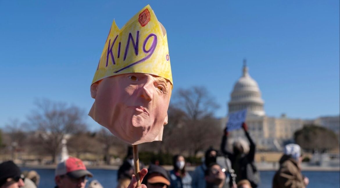 People take part in the "No Kings Day" protest on Presidents Day in Washington, in support of federal workers and against recent actions by President Donald Trump and Elon Musk, Monday, Feb. 17, 2025, by the Capitol in Washington. (AP Photo/Jose Luis Magana,File)