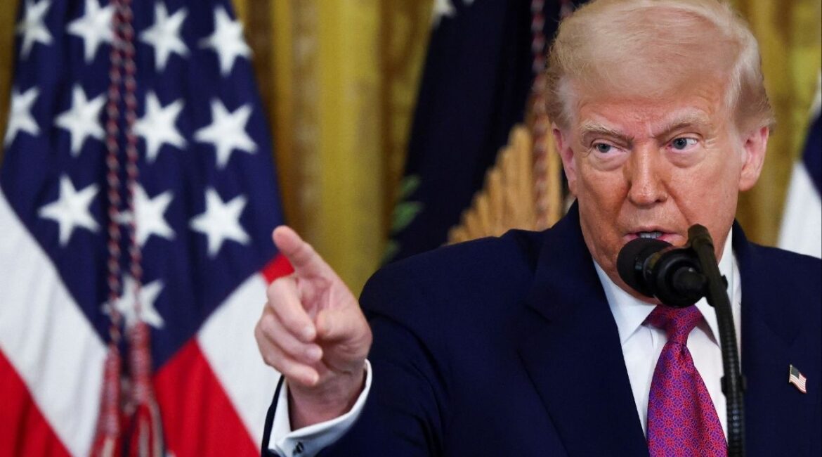 President Donald Trump signs a resolution at the White House in Washington, D.C., U.S., June 12, 2025. REUTERS/Evelyn Hockstein/ File Photo