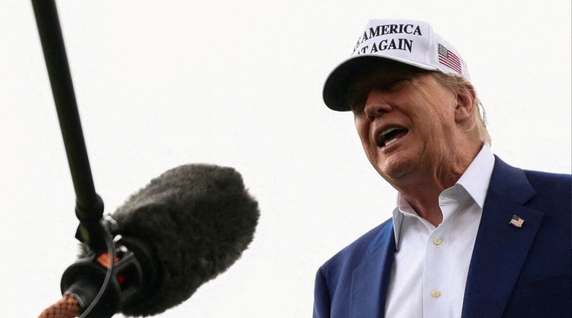 President Donald Trump speaks to members of the media during the installation of a new flagpole on the South Lawn at the White House in Washington, D.C., U.S., June 18, 2025. (Reuters/Kevin Lamarque)