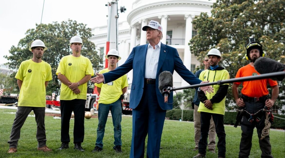 President Donald Trump talks about the new flag pole being installed on the South Lawn of the White House, in Washington, Wednesday, June, 18, 2025. President Trump decided to check the immigration status of a work crew installing a new flagpole at the White House. (Doug Mills/The New York Times)