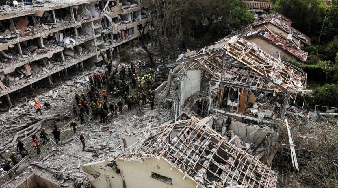 Rescuers and security personnel work at the impacted site after a missile attack from Iran, amid the Iran-Israel conflict in Tel Aviv, Israel June 22, 2025. (Reuters File)