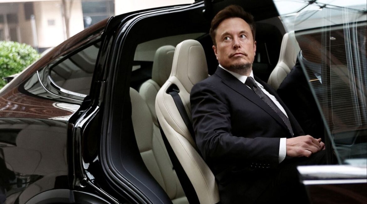 Tesla Chief Executive Officer Elon Musk gets in a Tesla car as he leaves a hotel in Beijing, China May 31, 2023. (Reuters File)