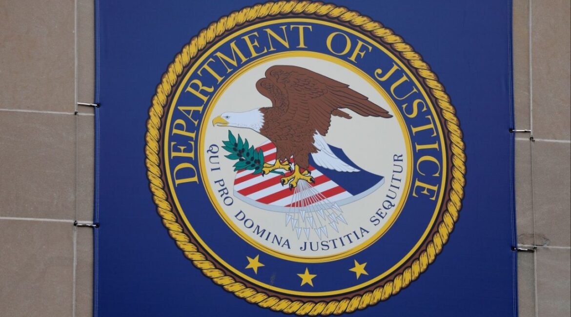 The crest of the United States Department of Justice (DOJ) is seen at their headquarters in Washington, D.C., U.S., May 10, 2021. REUTERS/Andrew Kelly/File photo