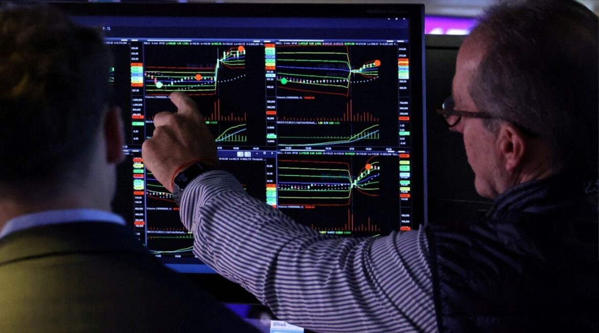 Traders work on the floor at the New York Stock Exchange (NYSE) in New York City, U.S., June 18, 2025. (Reuters File)