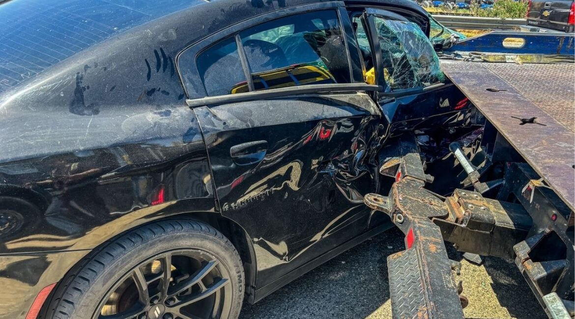 A 22-year-old suspected DUI driver crashed into a parked CHP motorcycle and tow truck on Highway 99 near Fresno, narrowly missing an officer and bystanders, CHP said Saturday, July 5, 2025. (CHP)