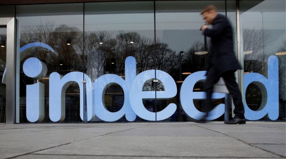A man walks past the offices of Indeed in the centre of Dublin, Ireland, February 10, 2020. (Reuters File)