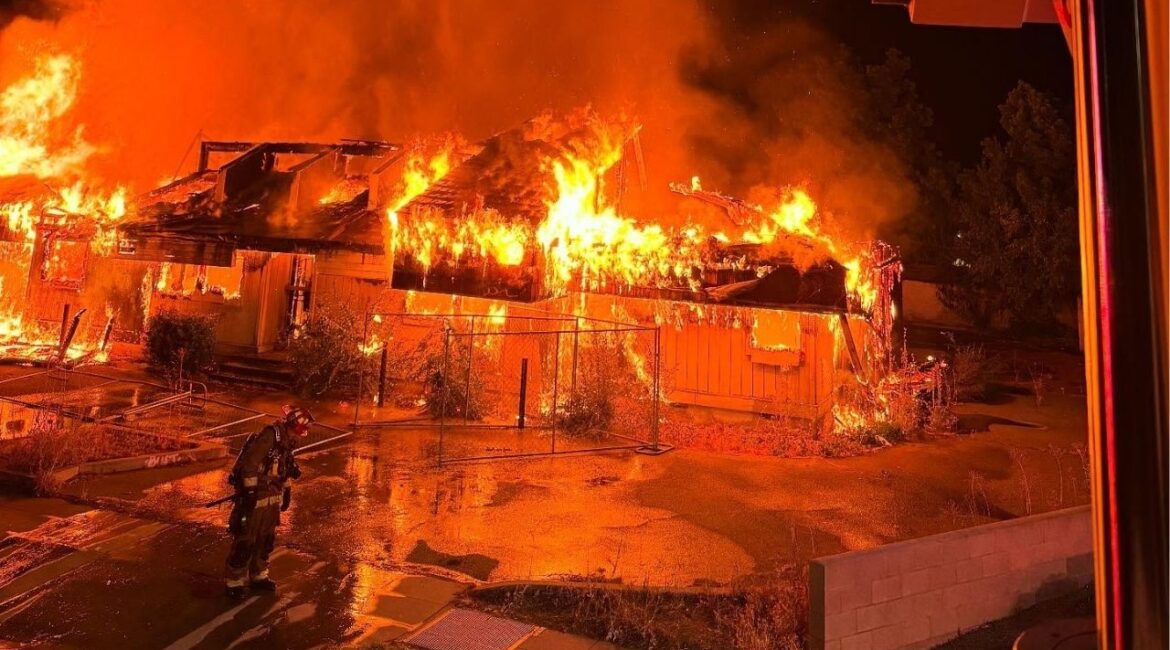 A vacant commercial building in northwest Fresno was destroyed by an early morning fire Sunday, July 20, 2025, with firefighters preventing the flames from spreading to nearby homes. (Fresno FD)