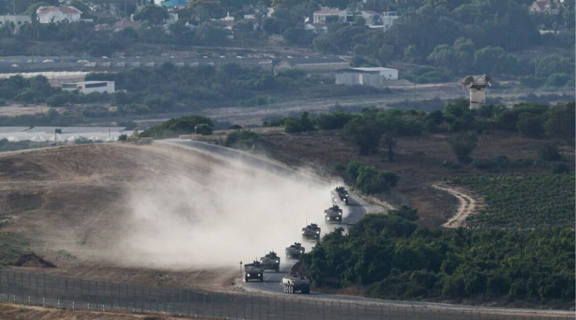 An Israeli military convoy manoeuvres near the Israel-Gaza border, as seen from Israel, July 1, 2025. (Reuters/Amir Cohen)