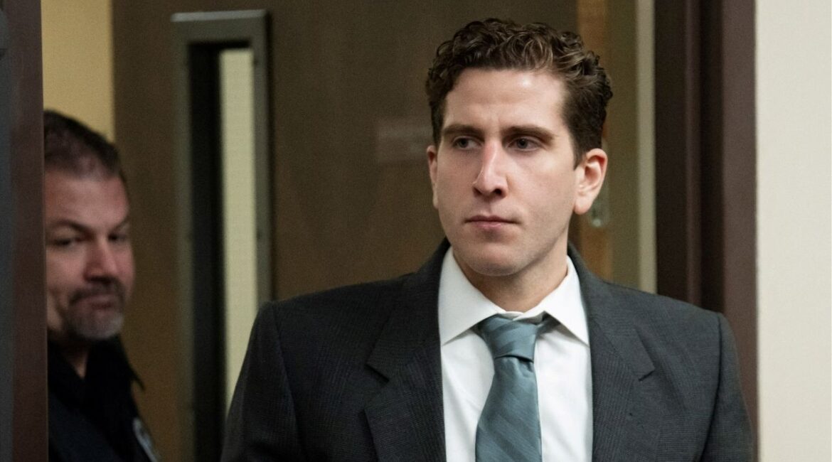 Bryan Kohberger, right, who is accused of killing four University of Idaho students in November 2022, is escorted into a courtroom to appear at a hearing in Latah County District Court, in Moscow, Idaho, U.S., September 13, 2023. (Reuters File)