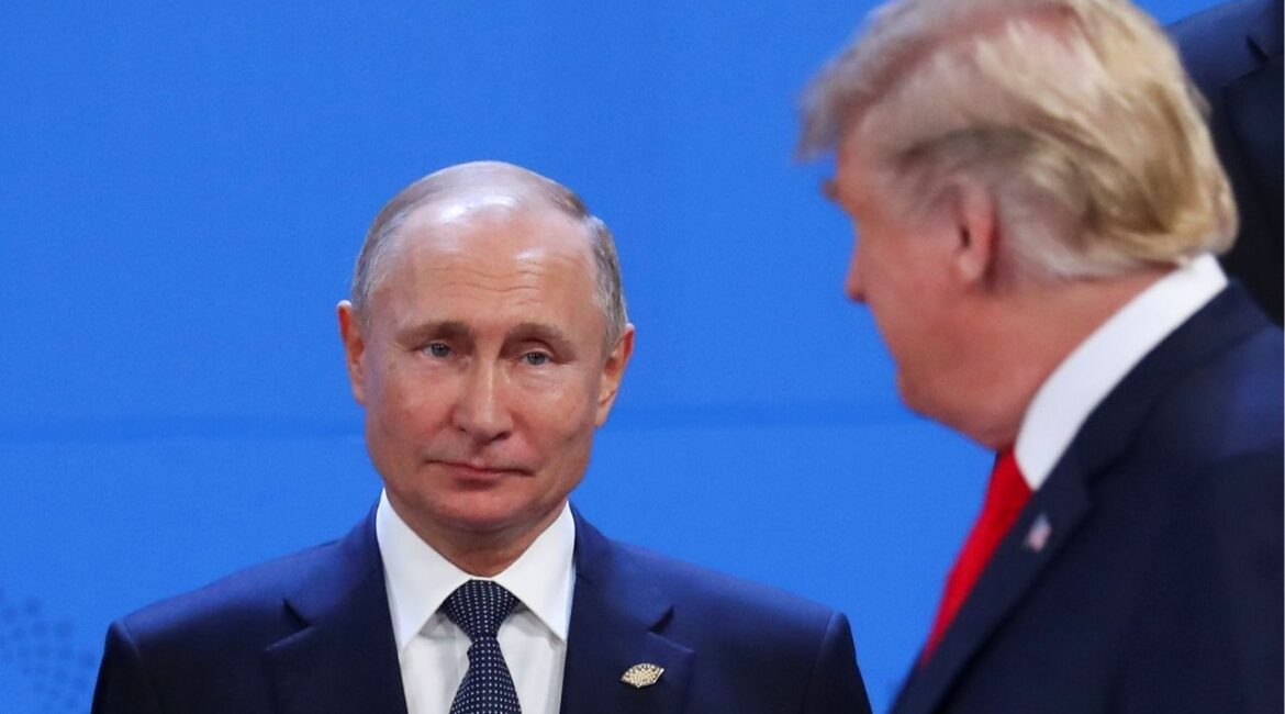 FILE PHOTO: Donald Trump and Russia's President Vladimir Putin are seen during the G20 leaders summit in Buenos Aires, Argentina November 30, 2018. REUTERS/Marcos Brindicci/File Photo