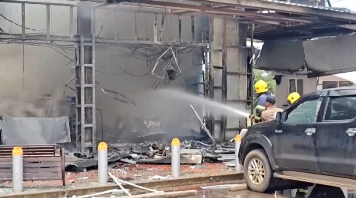Firefighters work to extinguish fire at a convenience store at a gas station, amid the clashes between Thailand and Cambodia, in Kantharalak district, Sisaket province, Thailand, July 24, 2025, in this screengrab obtained from a handout video. TPBS/Handout via REUTERS
