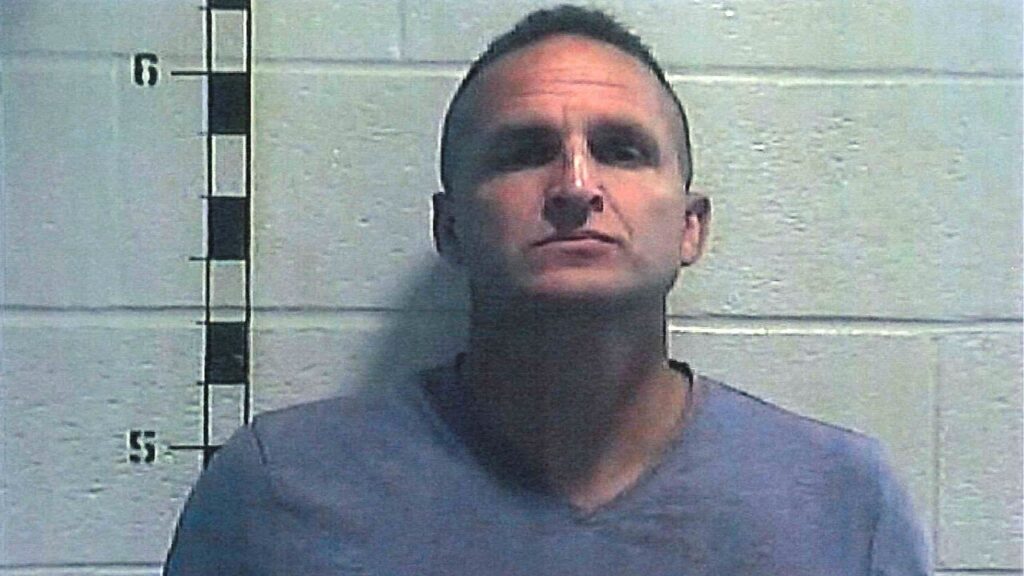 Former Louisville police detective Brett Hankison poses for a booking photograph at Shelby County Detention Center in Shelbyville, Kentucky, U.S. September 23, 2020. Picture taken September 23, 2020. Shelby County Detention Center/Handout via REUTERS.