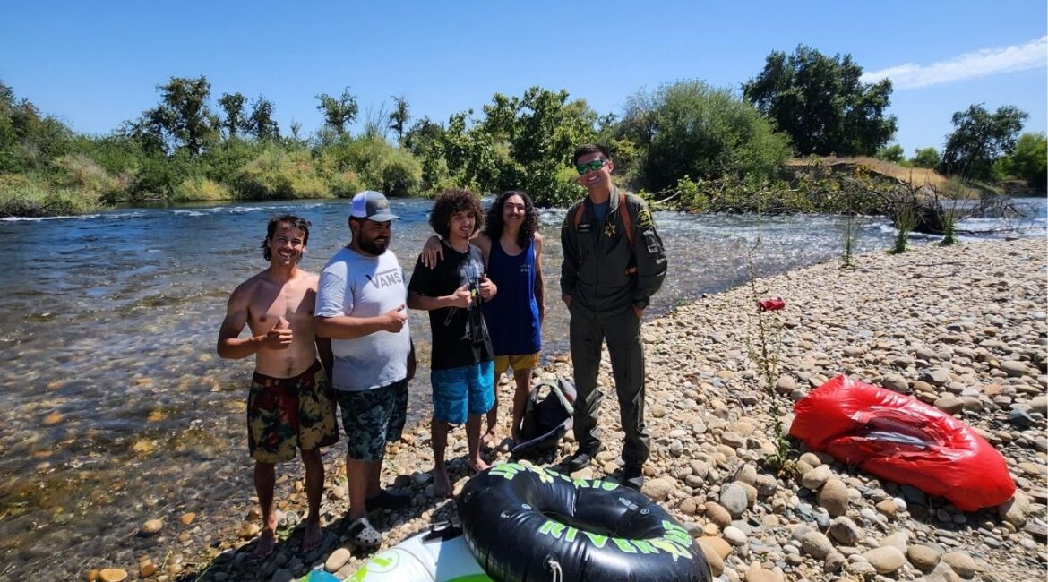 Four young men were rescued from the Kings River in Sanger on Tuesday, July 1, 2025, after getting stranded in rapids, thanks to life jackets, a rescue boat, and a sheriff’s helicopter. (Fresno County SO)