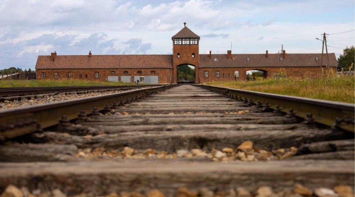 Kyle Langford, a Republican candidate for California governor, is facing widespread backlash after posting a photo of himself at Auschwitz with the caption “My 0% Unemployment Plan,” a message Holocaust memorial have condemned as deeply offensive. (Shutterstock)