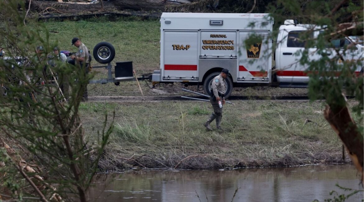 Members from Texas Game Wardens of the Law Enforcement Divison work following flash flooding, in Kerrville, Texas, U.S. July 6, 2025. REUTERS/Marco Bello