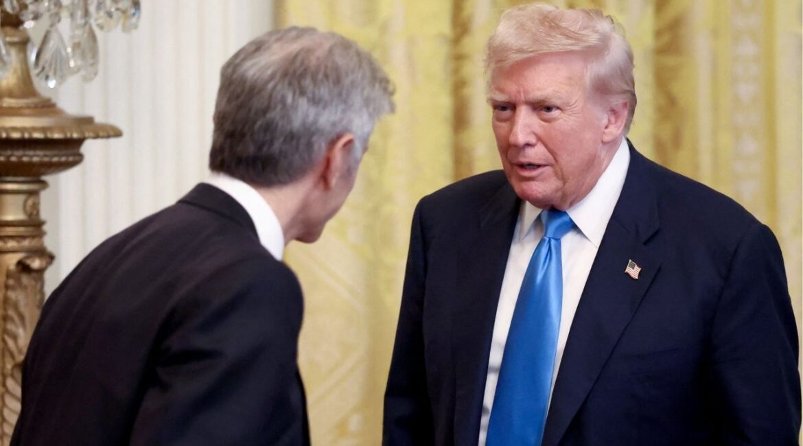 President Donald Trump speaks with Dr. Mehmet Oz, Administrator for the Centers for Medicare & Medicaid Services, during the "Making Health Technology Great Again" event in the East Room at the White House in Washington, D.C., U.S., July 30, 2025. (Reuters/Evelyn Hockstein)