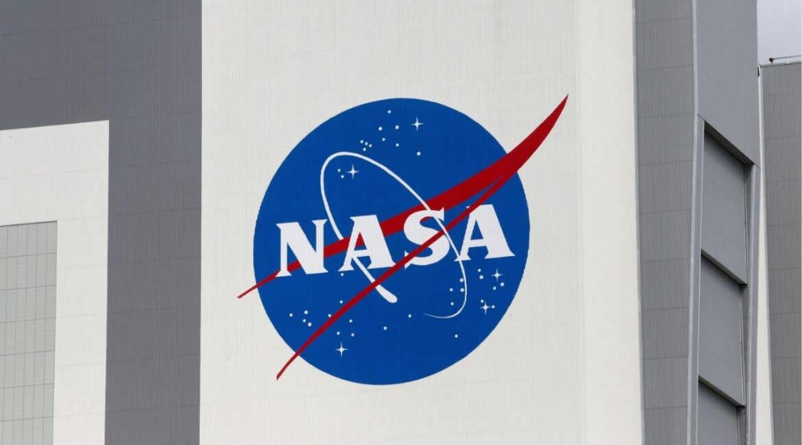 The NASA logo is seen at Kennedy Space Center in Cape Canaveral, Florida, U.S., April 16, 2021. (Reuters File)