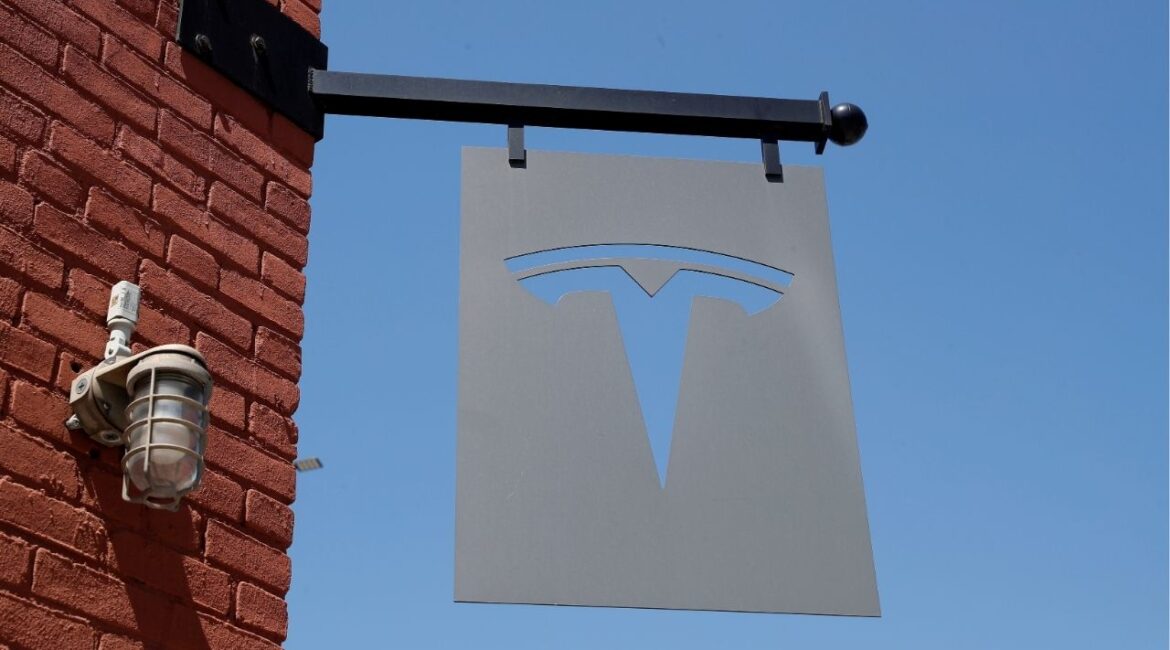 The TESLA logo is seen outside a dealership in the Brooklyn borough of New York City, U.S., April 26, 2021. (Reuters File)