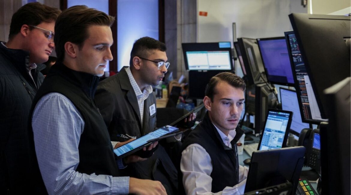 Traders work on the floor at the New York Stock Exchange (NYSE) in New York City, U.S., July 15, 2025. (Reuters File)