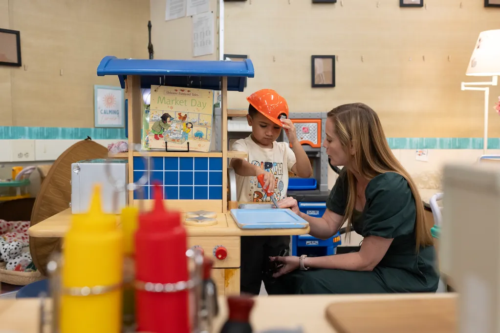 Teacher Working With a TK Student