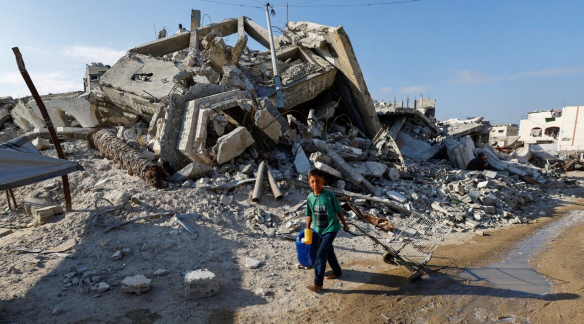 Palestinian Child Carrying Water Amid Gaza City Rubble