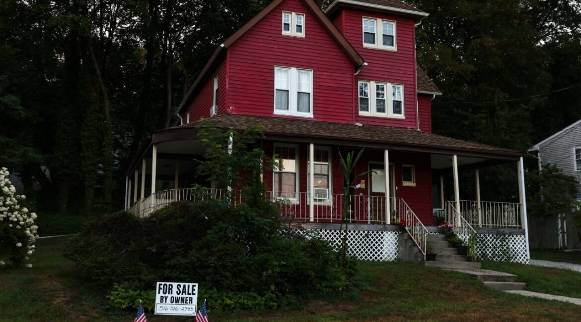 A "For Sale" sign stands in front of a house, on the North Shore of Long Island city of Glen Cove, New York, U.S., August 12, 2025. (Reuters File)