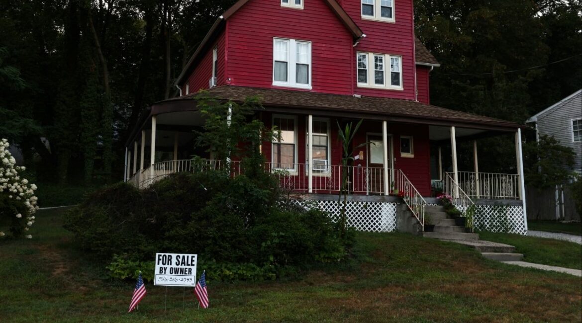A "For Sale" sign stands in front of a house, on the North Shore of Long Island city of Glen Cove, New York, U.S., August 12, 2025. (Reuters File)