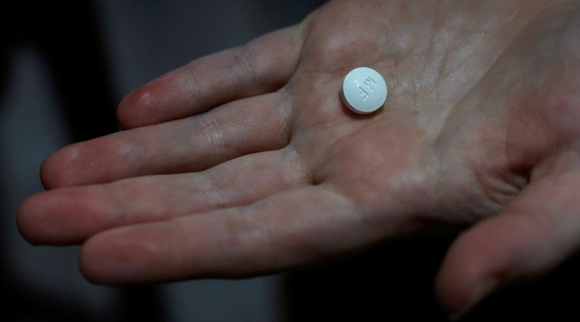 A patient prepares to take Mifepristone, the first pill in a medical abortion, at Alamo Women's Clinic in Carbondale, Illinois, U.S., April 9, 2024. (Reuters File)