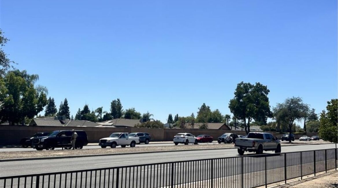 A three-vehicle crash on Herndon Avenue in Fresno prompted police to block off the area Tuesday, August 5, 2025, after one car was spun around, though no injuries were reported. (GV Wire)