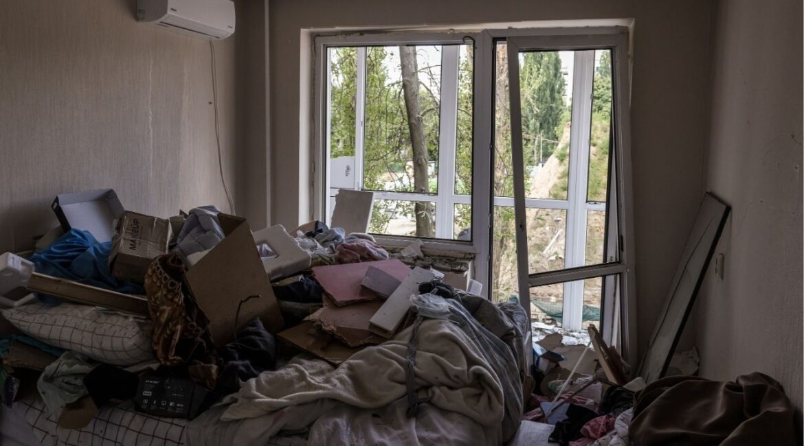 A view inside one of the apartments in the residential building that was partly destroyed by a Russian missile the night of July 31 in Kyiv, Ukraine, Aug. 4, 2025. Veronika Osintseva went to sleep in her bed on the ninth floor of an apartment building in Kyiv and woke up on a pile of rubble outside. She saw her leg covered in blood and cried out for help, thinking only of the pain, she would later say, and not how she had survived. (Oksana Parafeniuk/The New York Times)