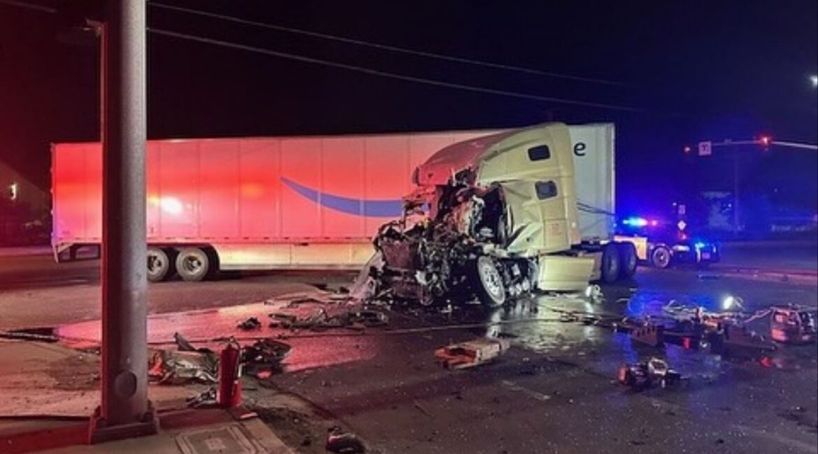 An Amazon semi ran a red light and collided with another truck in Visalia early Saturday, Aug. 30, 2025, seriously injuring the driver. (Visalia PD)