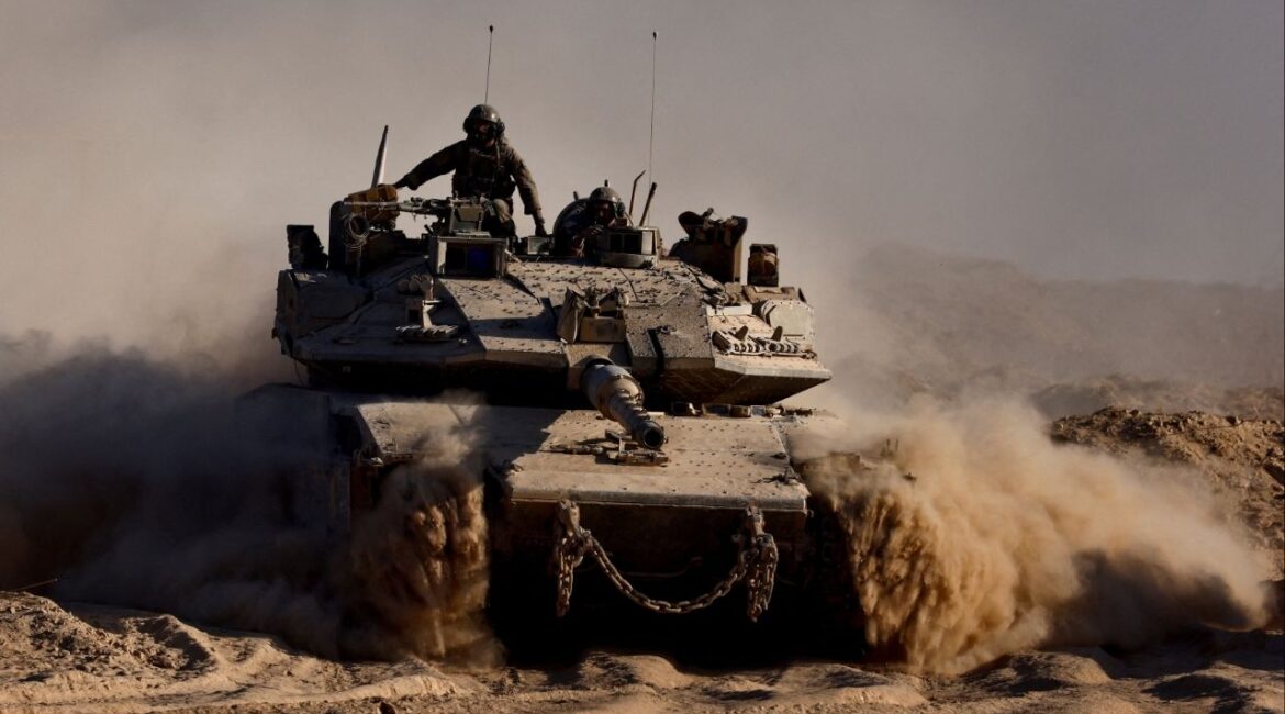 An Israeli tank manouvres at the Israel-Gaza border, as seen from Israel, August 26, 2025. (Reuters File)
