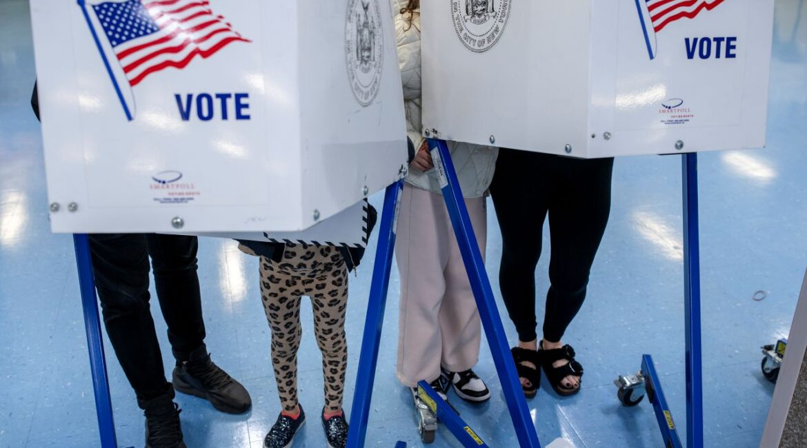 Voters filling out ballots in Manhattan, New York