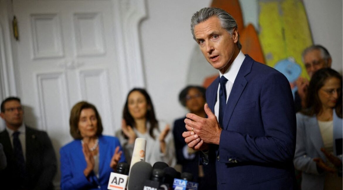 California Governor Gavin Newsom speaks at a press conference, accompanied by members of the Texas Democratic legislators, at the governor’s mansion in Sacramento, California, U.S., August 8, 2025. REUTERS/Carlos Barria