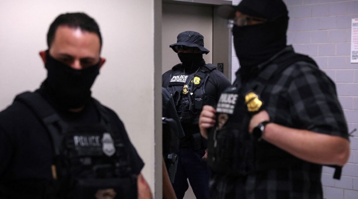 Federal immigration officers stand with masks, as federal detainments continue, in the hallways of U.S. immigration court in New York City, U.S., August 19, 2025. (Reuters File)