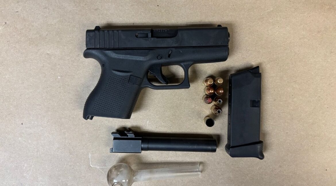 Fresno police arrested two convicted felons after a traffic stop led to the discovery of firearms, ammunition, drugs and outstanding warrants. (Fresno PD)