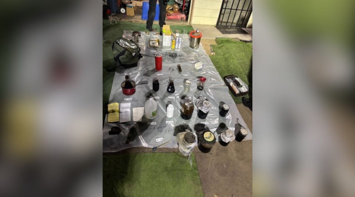 Fresno police discovered two narcotics labs, multiple firearms, and operating slot machines during a probation check, leading to three arrests. (Fresno PD)