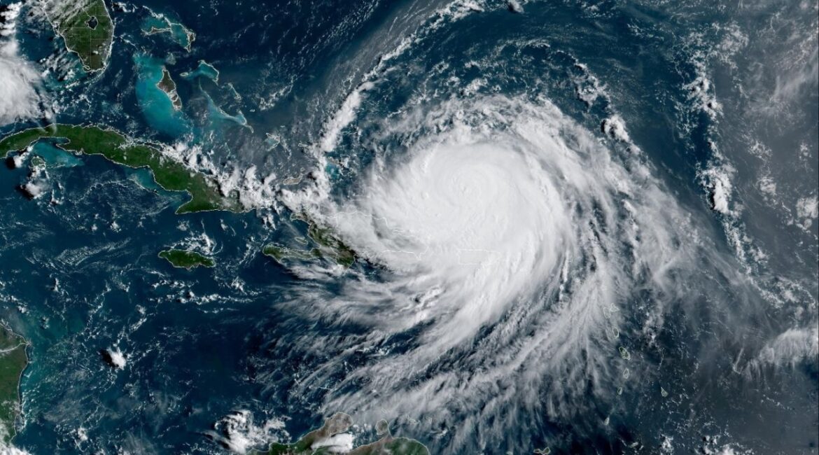 Hurricane Erin, which is the first hurricane of the 2025 Atlantic season and has been downgraded to Category 3, moves westward near Puerto Rico in a composite satellite image August 17, 2025. CIRA/NOAA/Handout via REUTERS