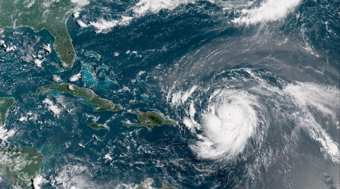 Hurricane Erin, which is the first hurricane of the 2025 Atlantic season and has developed into a dangerous Category 4 hurricane, moves westward near Puerto Rico in a composite satellite image August 16, 2025. CIRA/NOAA/Handout via REUTERS